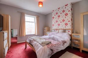 Bedroom One- click for photo gallery